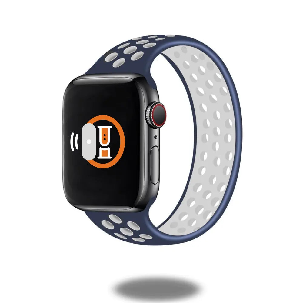 Sport Silicone Solo Loop Band for Apple Watch in navy blue with white holes, ideal for active lifestyles.