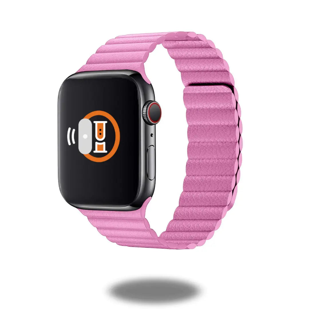 Adjustable pink leather Apple Watch band with two-way magnetic closure for safety and comfort.