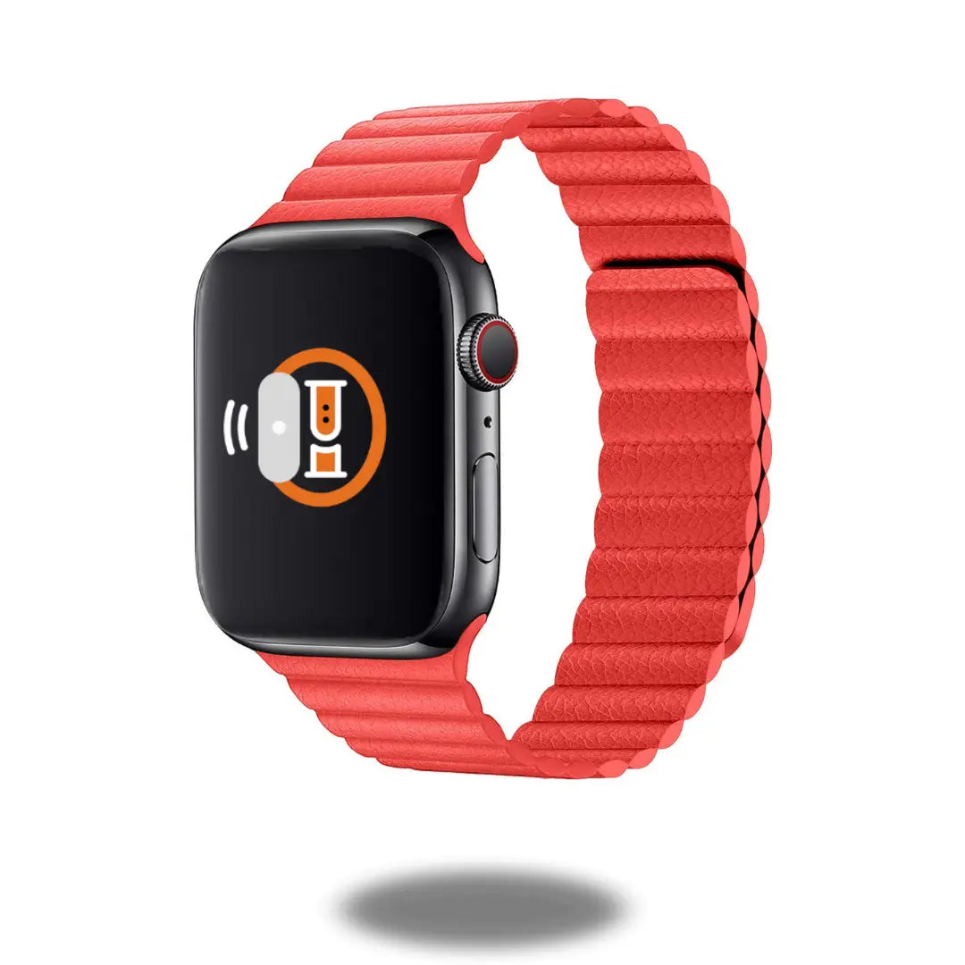 Adjustable red leather loop Apple Watch band with two-way magnetic closure for a secure fit during activities.
