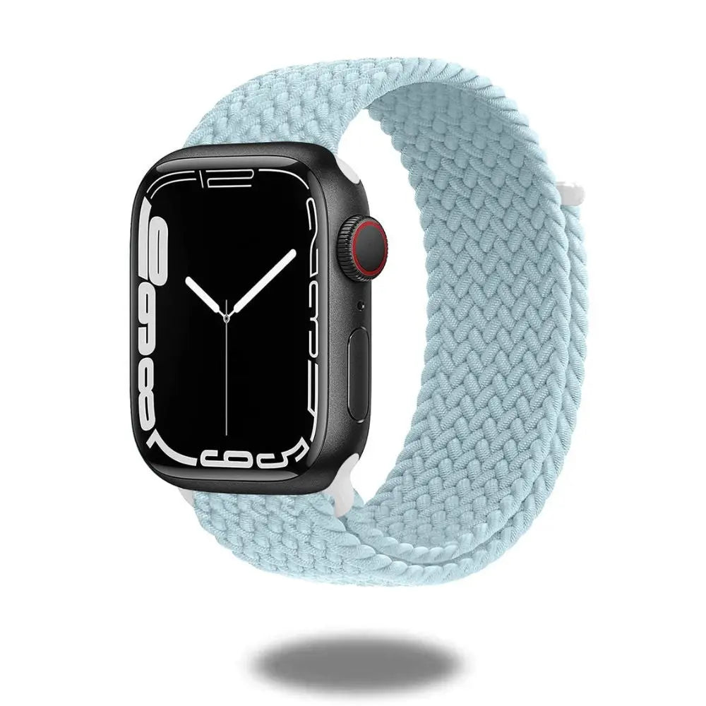 Light blue braided sports band for smartwatches, adjustable and stretchable for comfort during exercise.