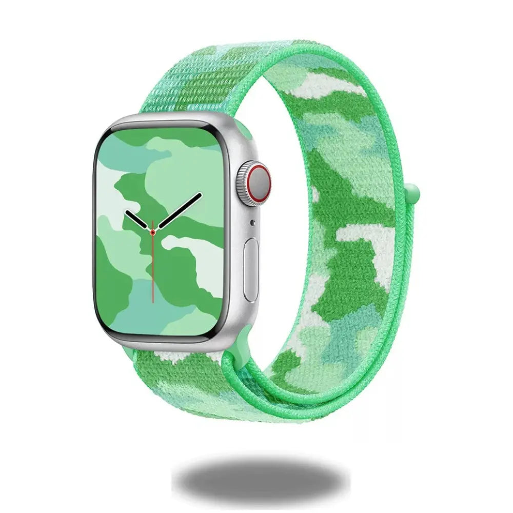 Camouflage sports nylon band for Apple Watch, featuring a green fabric-like design. Ideal for workouts and casual wear.
