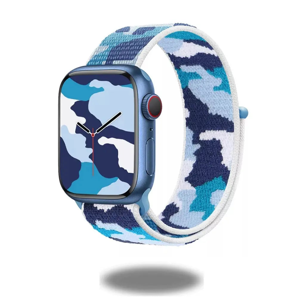 Apple Watch with a blue camouflage nylon loop band, perfect for sports and casual wear.