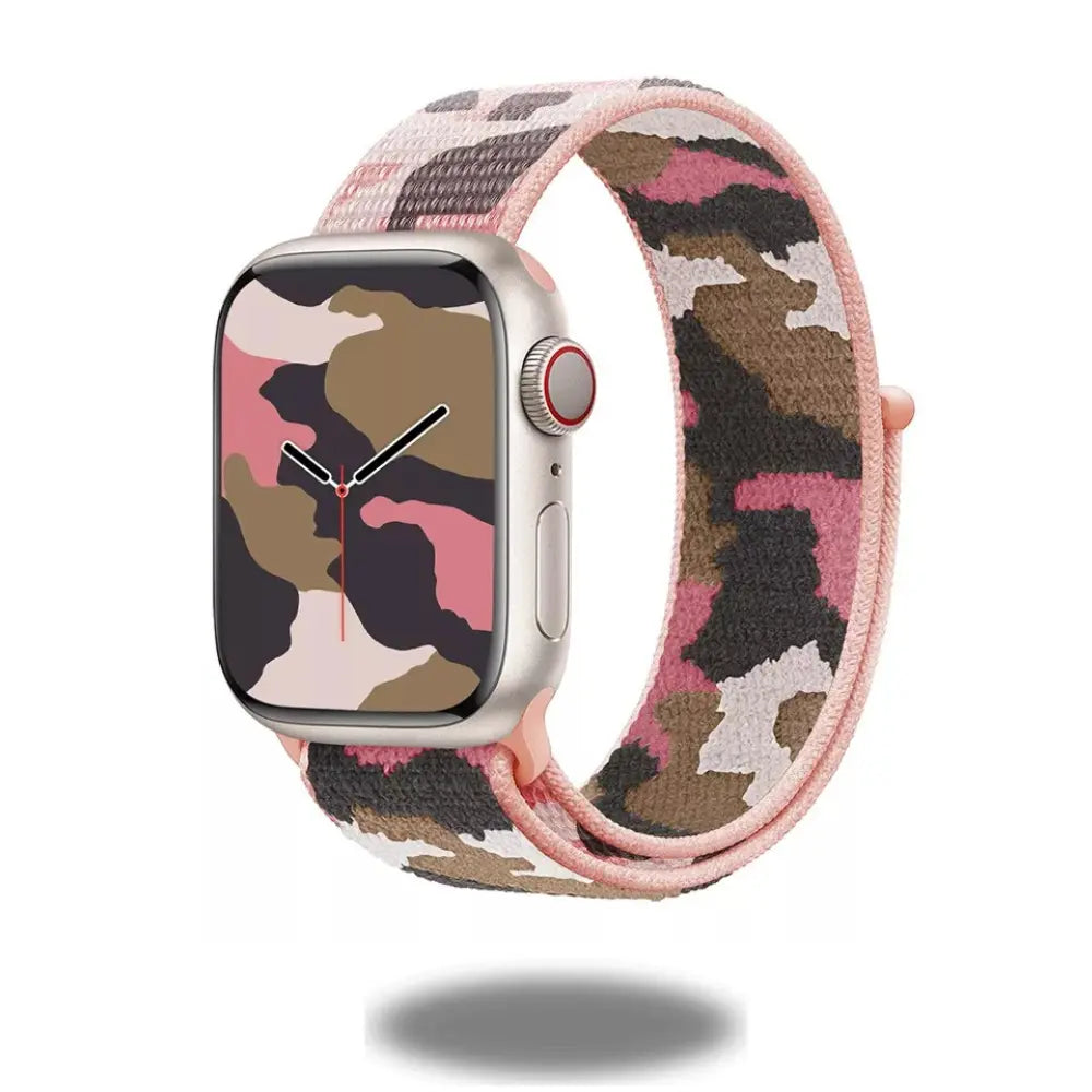 Camouflage sports nylon band for Apple Watch in pink and green pattern, ideal for workouts and casual wear.