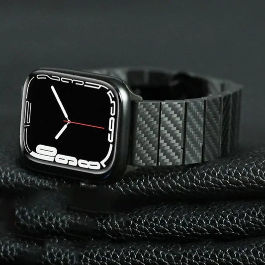 Carbon fiber strap for Apple Watch showcasing sleek, minimalist design on a black background.