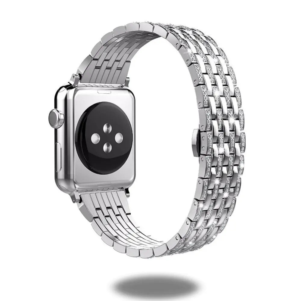 Luxury jewelry bracelet for Apple Watch, stainless steel with CZ stones, adjustable up to 9 inches, eye-catching design.