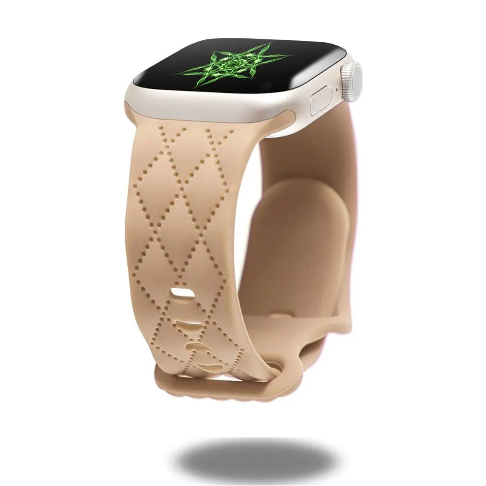 Modern silicon sports band in beige with a hole-patter design for Apple Watch, blending style and functionality.