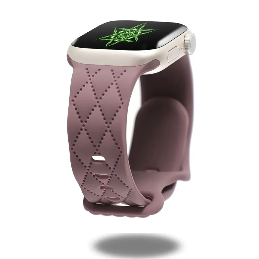 Modern silicon sports band in mauve for Apple Watch, featuring a dual clasp design and breathable pattern.
