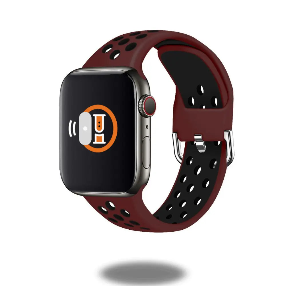 Silicone sport band with metal buckle for smartwatches, featuring breathable design in red color, perfect for outdoor activities.