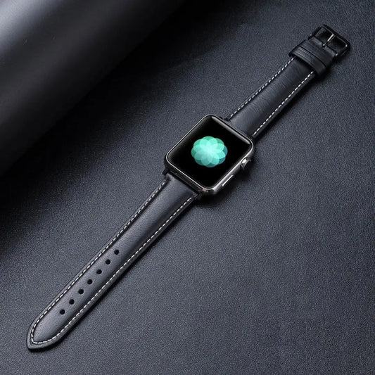 Genuine leather Apple Watch band in oil-waxed finish with classic pattern, displayed on a black background.
