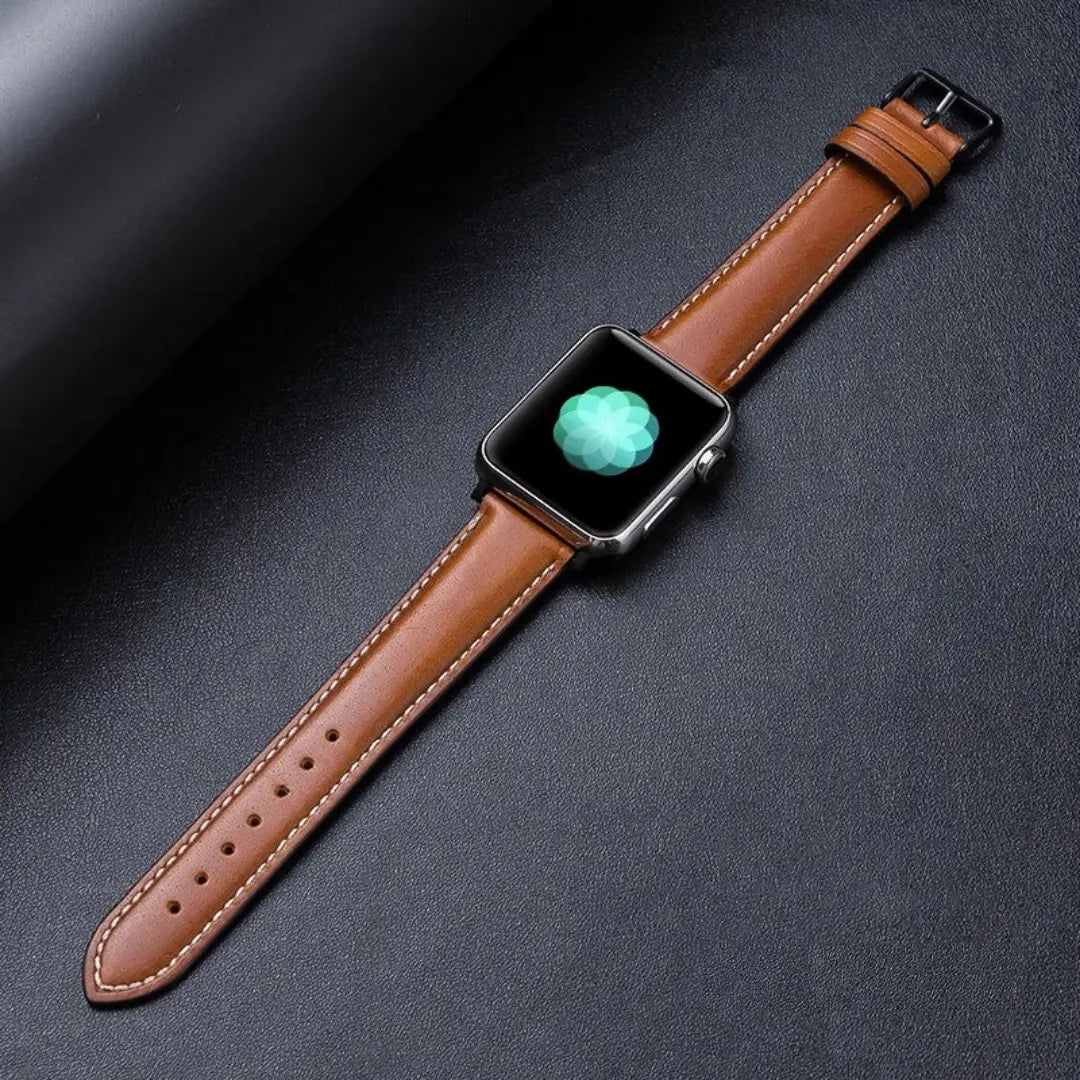 Oil waxed genuine leather Apple Watch band in brown with classic pattern, showcasing elegance and craftsmanship.