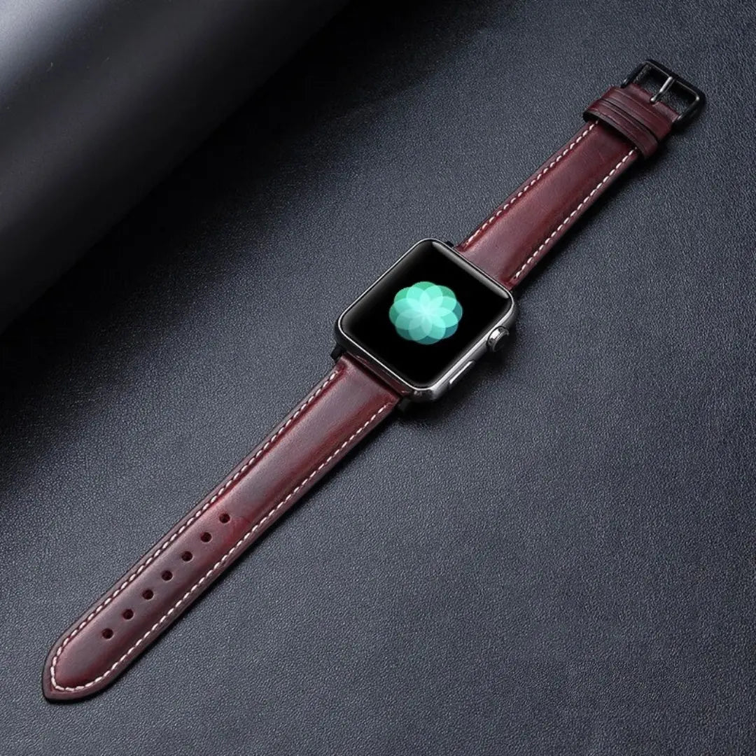 Oil waxed genuine leather Apple Watch band in burgundy with an elegant design, perfect for a gentleman look.