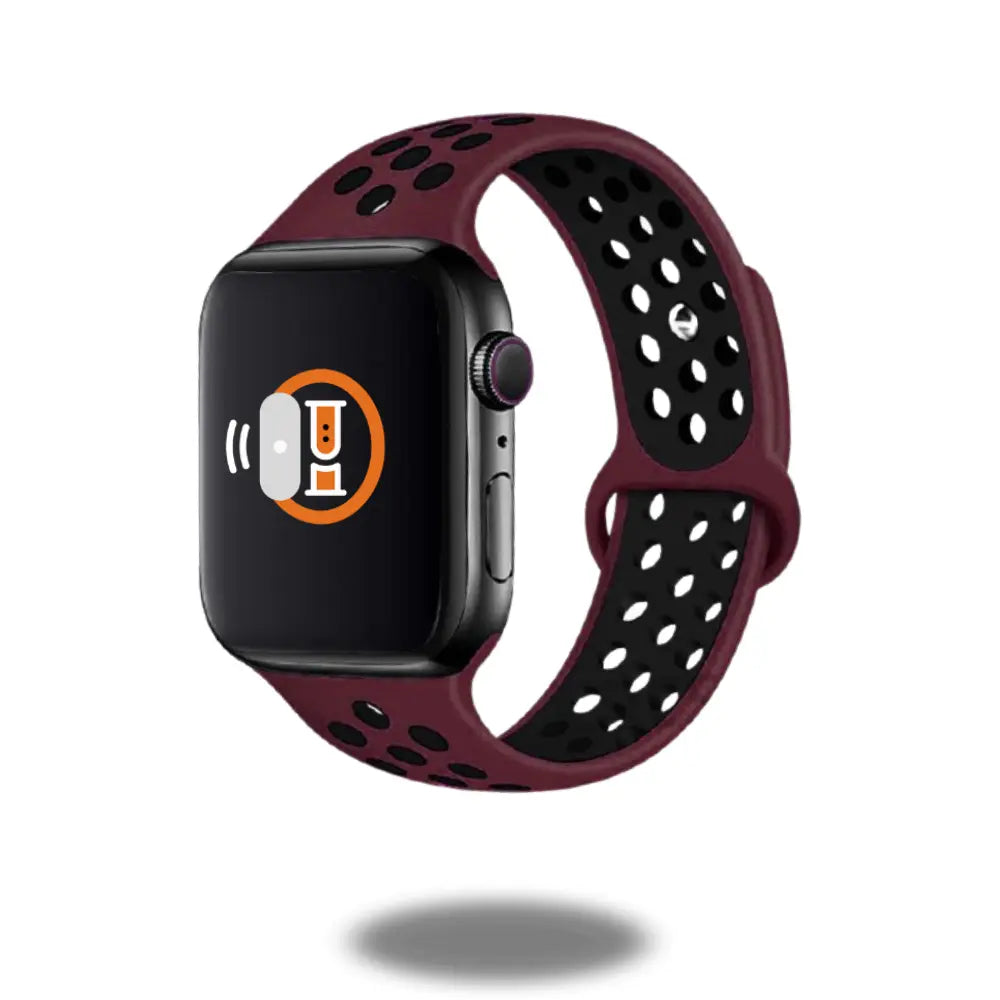 Apple Watch with a maroon silicon sport band, breathable design, perfect for workouts and everyday style.