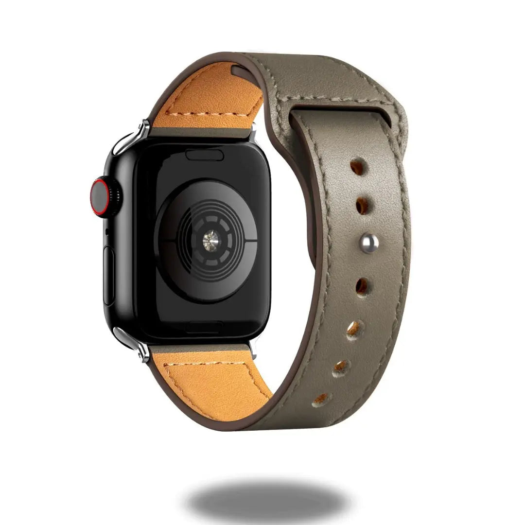 Stylish leather strap for Apple Watch in gray, featuring a comfortable and secure design, perfect for daily wear.