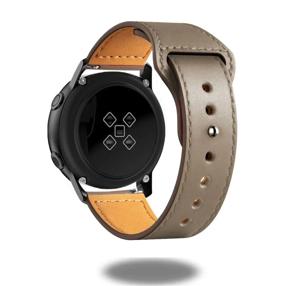 Stylish leather band for Samsung Galaxy Watch displaying black dial and comfortable tan underside.