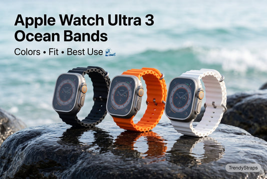 Apple Watch Ultra 3 with colorful Ocean Bands in black, orange and white on a coastal background