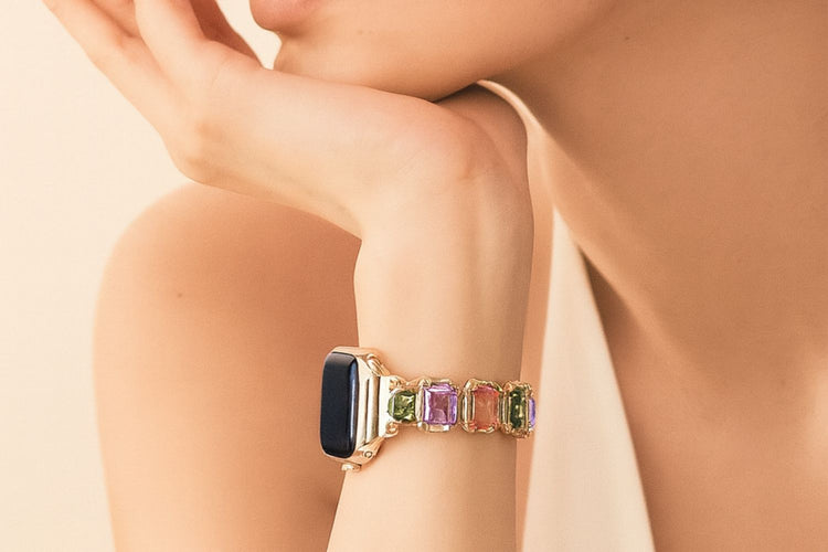 Elegant Apple Watch band for women, featuring colorful gemstones and a stylish design, perfect for any outfit.