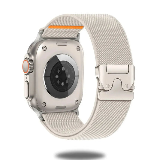 Enzo, The Stretchy Loop Apple Watch band featuring a titanium parachute clasp and breathable nylon for comfort and durability.
