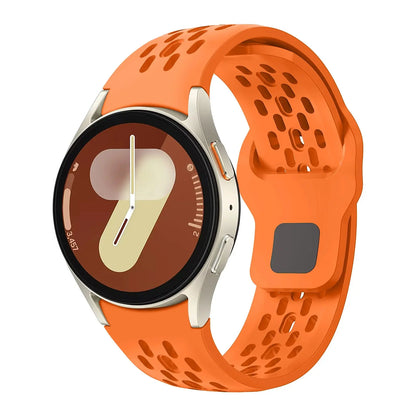 Sport Silicone Breathable Bands on Samsung Galaxy Watch in vibrant orange, designed for comfort and ventilation.