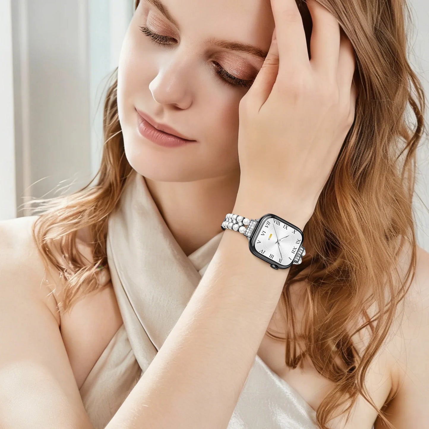 Apple Watch Jewelry Strap for Women – Pearl Metal Bracelet worn by a woman, showcasing style and elegance.