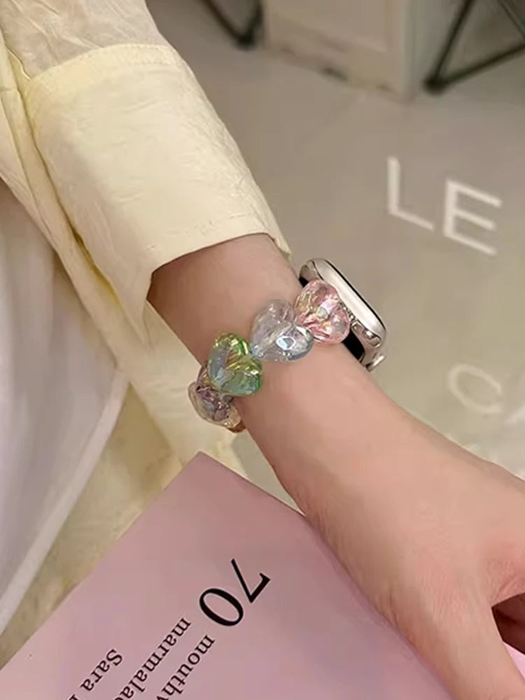 Love Band for Apple Watch – Laser Acrylic Bracelet Strap for Women shown on wrist with colorful heart-shaped beads.