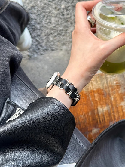Retro Leather Apple Watch Band for Women (38–49mm) showcased with a stylish outfit and drink.