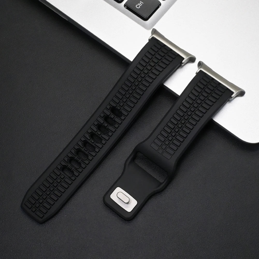 Soft Silicone Sport Band for Samsung Galaxy Watch Ultra & 8 on a black background near a laptop.