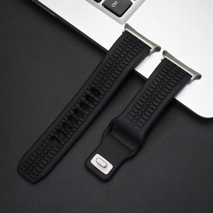 Soft Silicone Sport Band for Samsung Galaxy Watch Ultra & 8 on a black background near a laptop.