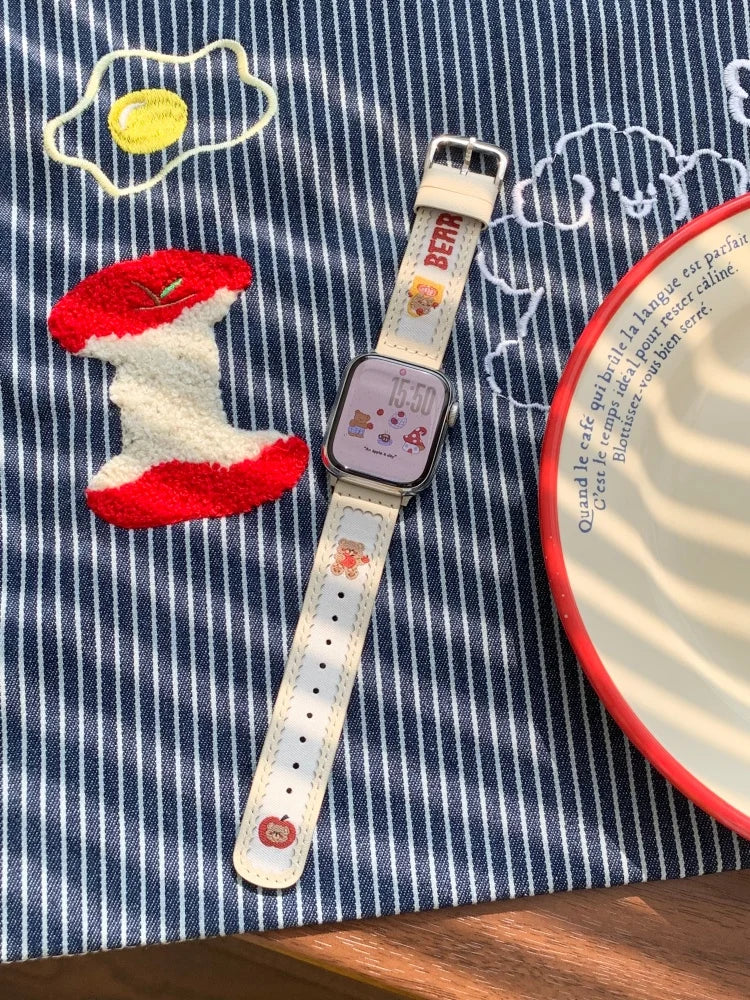 Cute Bear Leather Apple Watch Band for Women (38–49mm) with embroidered bear and fruit design on a striped background.