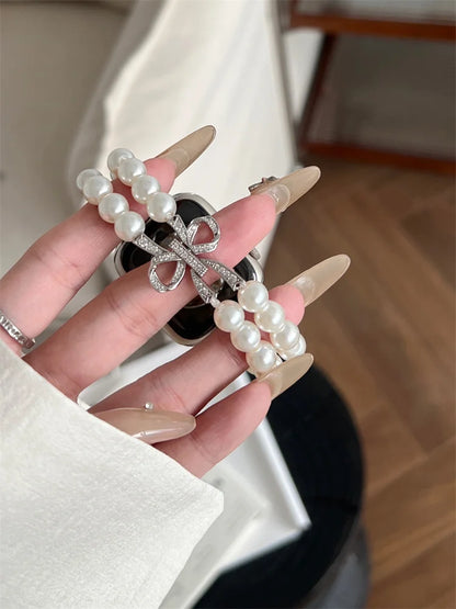 Luxury Pearl & Diamond Bow Apple Watch Band (38–49mm)
