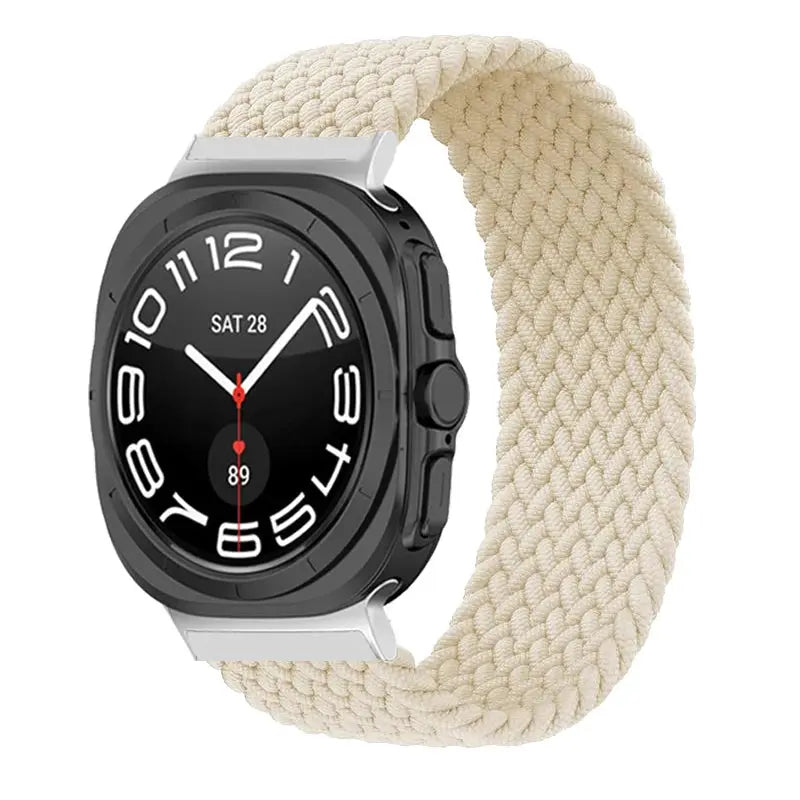 Stretchy Braided Solo Bands for Galaxy Watch Ultra in cream color on smartwatch, ideal for comfort and style.