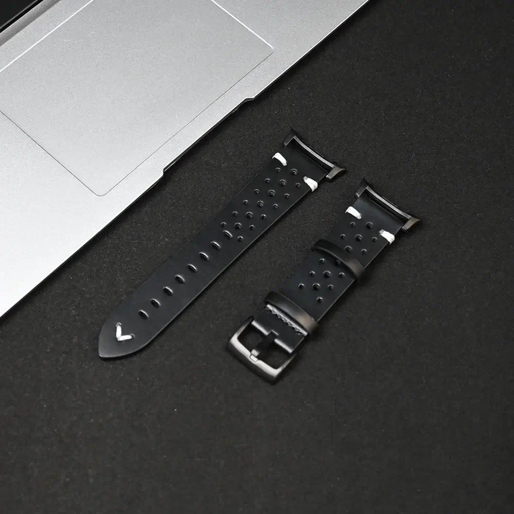 Leather Samsung Galaxy Watch 8 Bands | Classic & Ultra 47mm Strap close-up on a black background with a laptop.