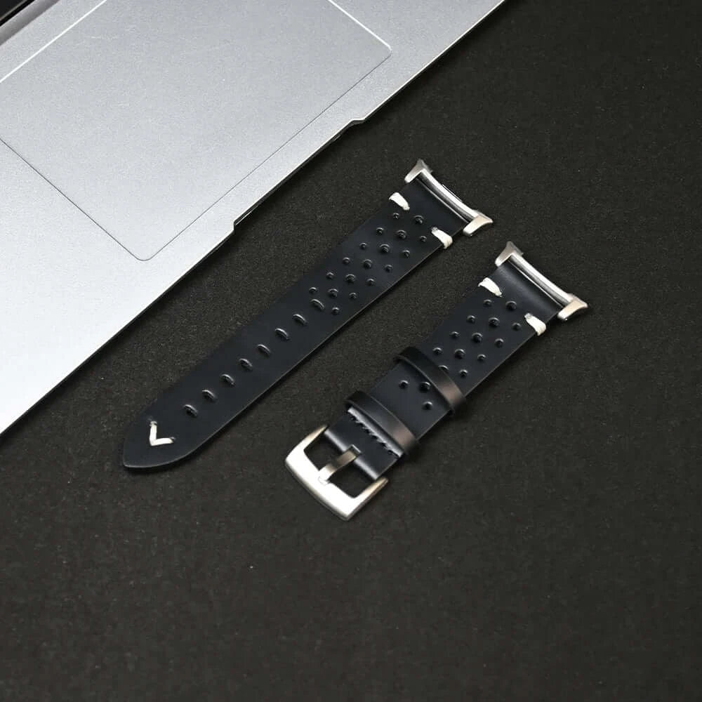Leather Samsung Galaxy Watch 8 Bands | Classic & Ultra 47mm Strap on a black surface next to a laptop.