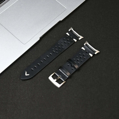 Leather Samsung Galaxy Watch 8 Bands | Classic & Ultra 47mm Strap on a black surface next to a laptop.