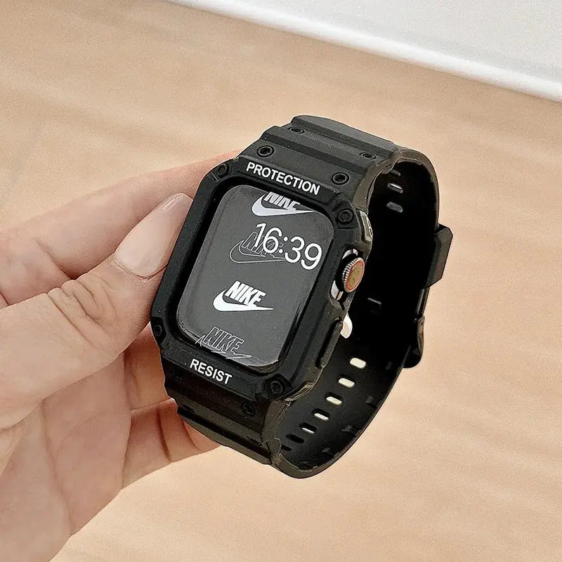 Black sports watch with Nike logos and protection features, held in a hand, showcasing a digital time display.