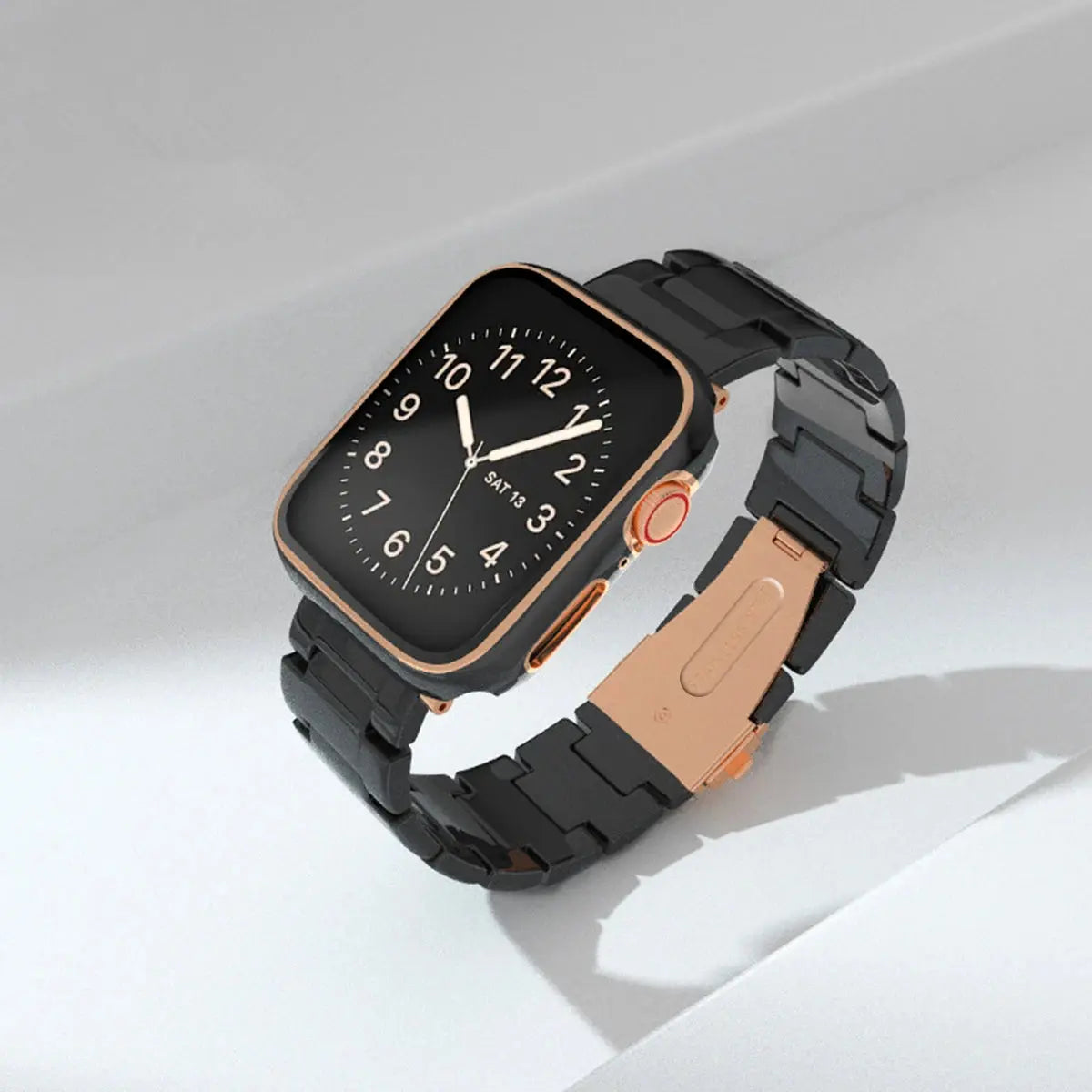 Stylish black Apple Watch with rose gold accents and a sleek band on a light background.