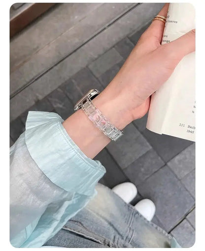 Clear Slim Apple Watch Bracelet on wrist, showcasing elegant design and polished acrylic finish.