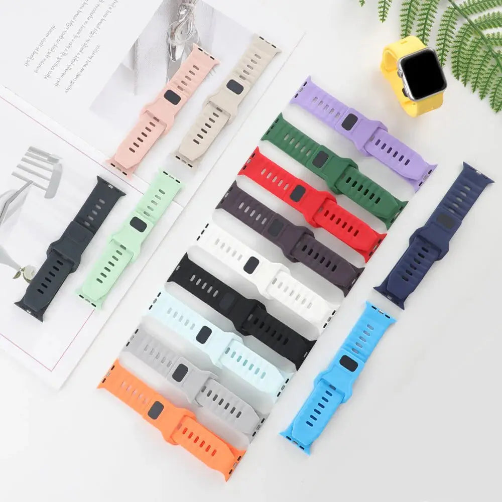 Colorful collection of rugged silicon sports bands for Apple Watch in various styles and sizes, ideal for adventure lovers.
