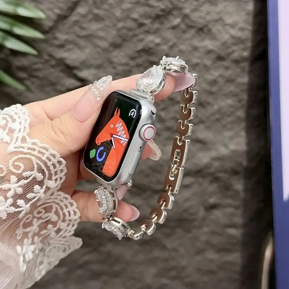 Contessa Slim Diamond Apple Watch Band for Women – Elegant Bracelet worn on wrist with elegant outfit and watch face visible.