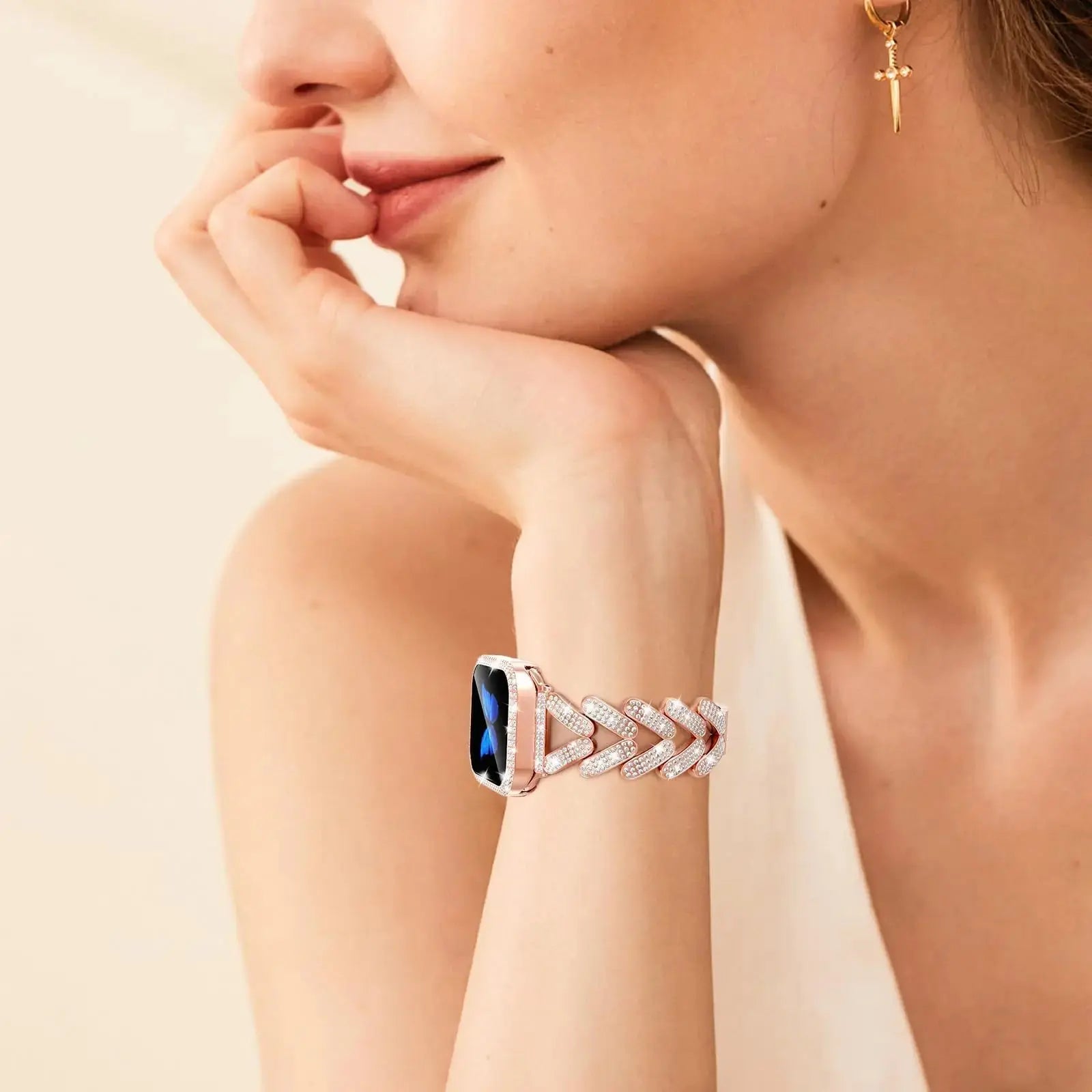 Dizza Jewelry Bracelet for Apple Watch, adorned with rhinestones, worn elegantly on wrist.
