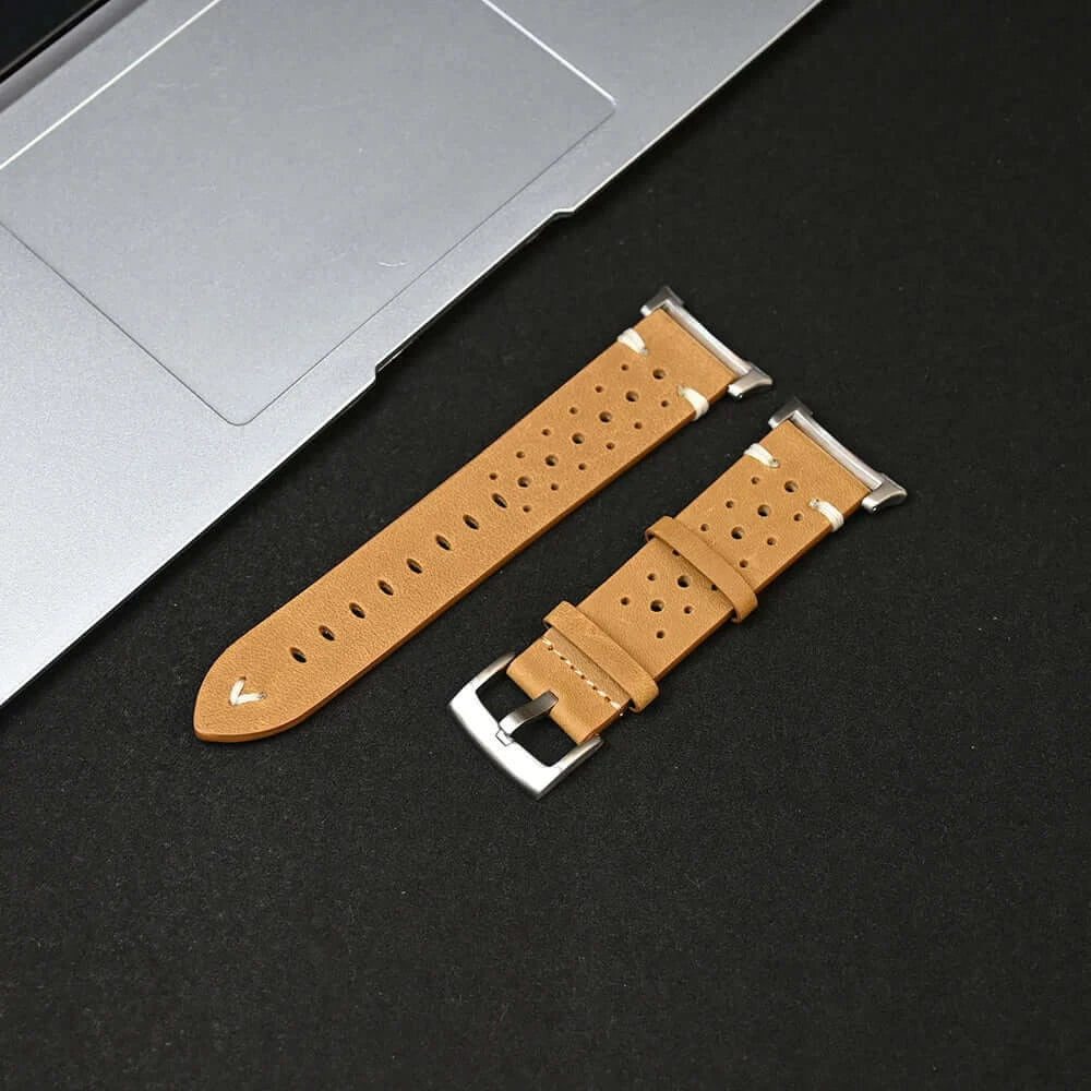 Leather Samsung Galaxy Watch 8 Bands | Classic & Ultra 47mm Strap in tan color with metal buckle, displayed beside a laptop.
