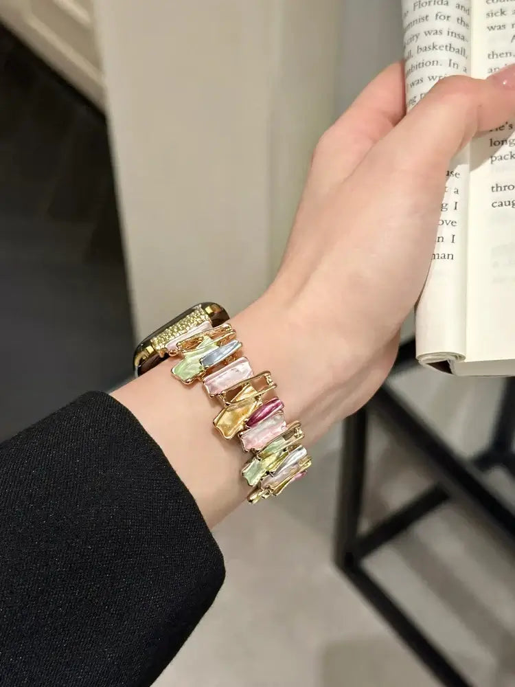 Luxury Elastic Metal Bracelet Band for Apple Watch Women showcasing colorful gemstones on a stylish wrist.