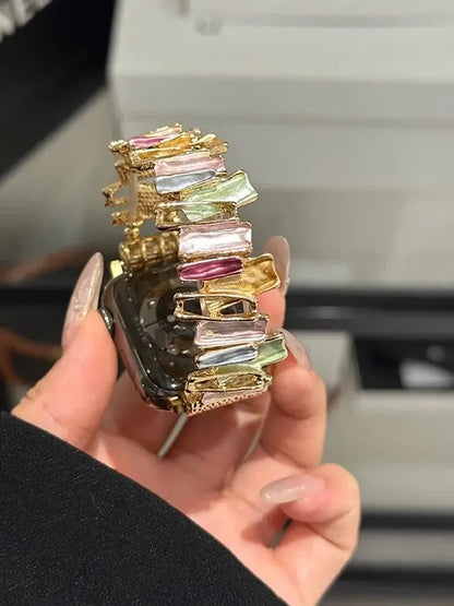 Luxury Elastic Metal Bracelet Band for Apple Watch Women worn on a wrist with colorful gemstone accents.