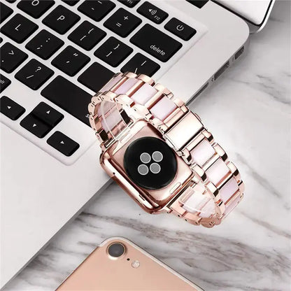 Luxury metal resin strap watch on a laptop keyboard, showcasing its stylish design and premium materials.