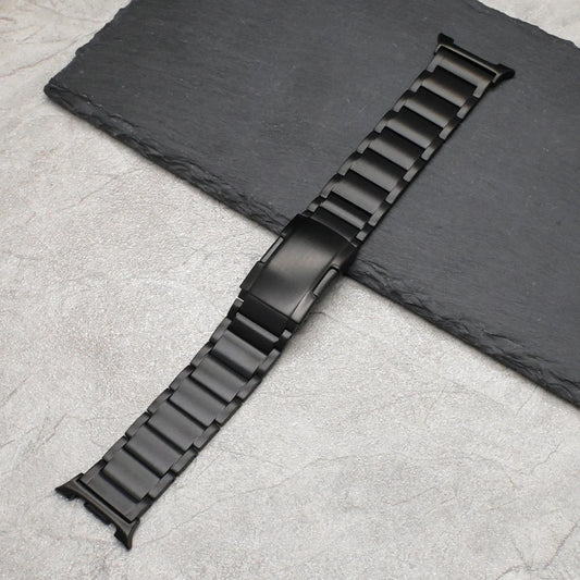 No-Gap Titanium Band for Galaxy Watch 8 & 8 Classic (46/44/40mm) black strap flat lay on stone background.