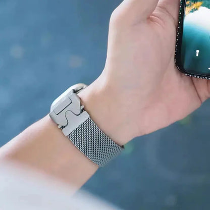 Close-up of a premium Metal Mesh Loop for Apple Watch, showcasing its parachute-style buckle and lightweight design.