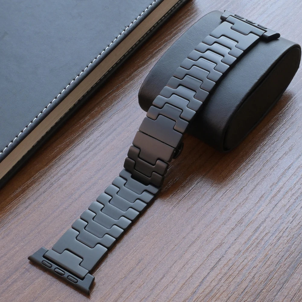 Titanium Apple Watch Band Ultra 3/Series 11/SE – Luxury Bracelet on a black surface with an elegant design.