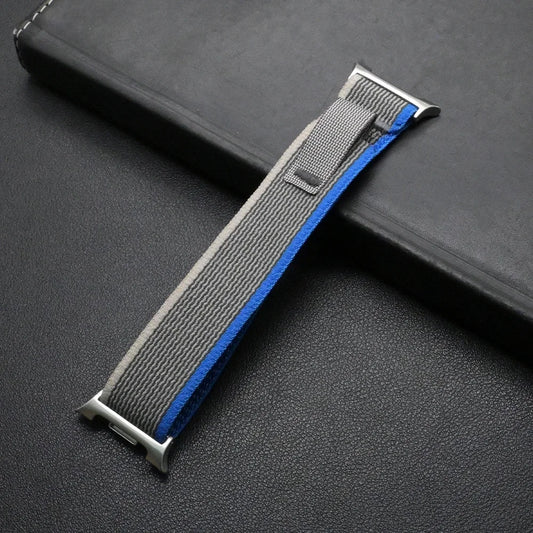 Travel Nylon Sport Loop Band for Galaxy Watch 8 & Ultra 47mm on a black surface, showcasing its lightweight design.