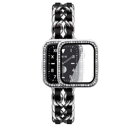 Luxury stainless steel chunky bracelet with black leather strap and rhinestone-adorned Apple Watch case.
