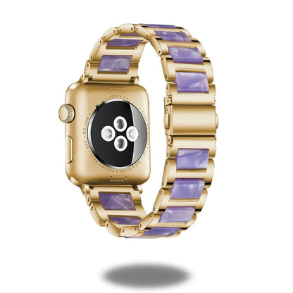 Luxury gold watch with purple resin strap, stylish design, elegant craftsmanship, and premium stainless steel frame.