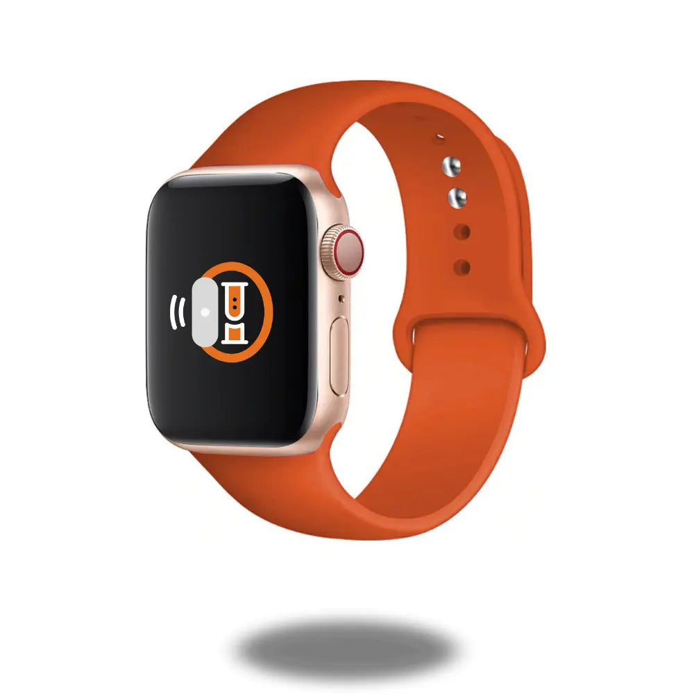 White Sports Silicone Band for Apple Watch on a gold watch, showcasing performance and sporty style.